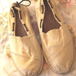 NEW. TOMS Cream Slip-On Shoes